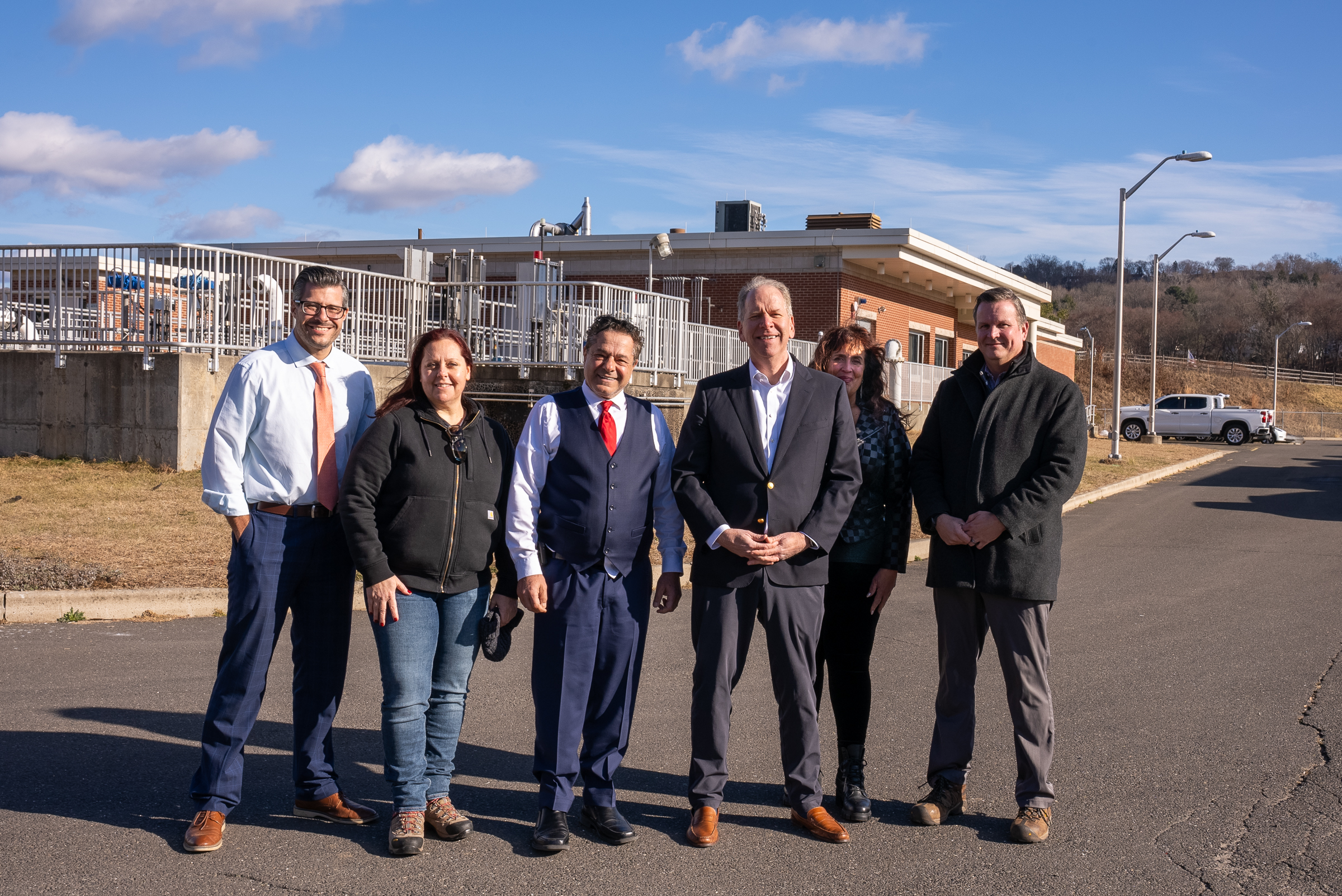 members of Aquarion Water Company and the City of Ansonia in front of the City of Ansonia’s municipal wastewater system